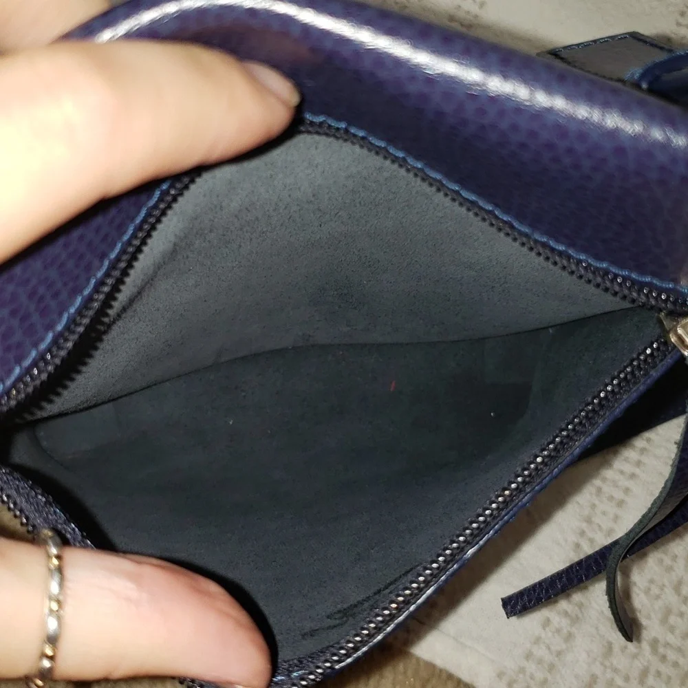 Laurige Criateru purple genuine Leather crossbody purse. Silver hardware.